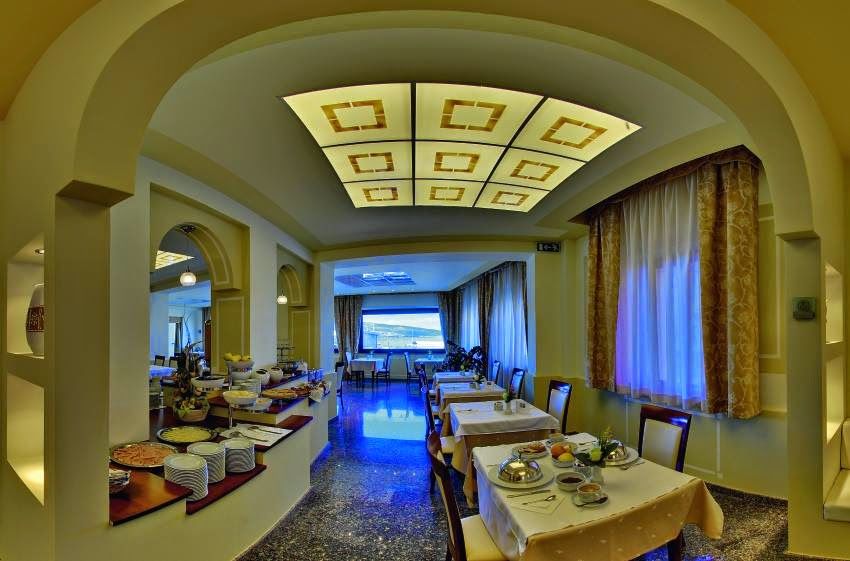 Hotel Corallo Isola Rossa Restoran foto