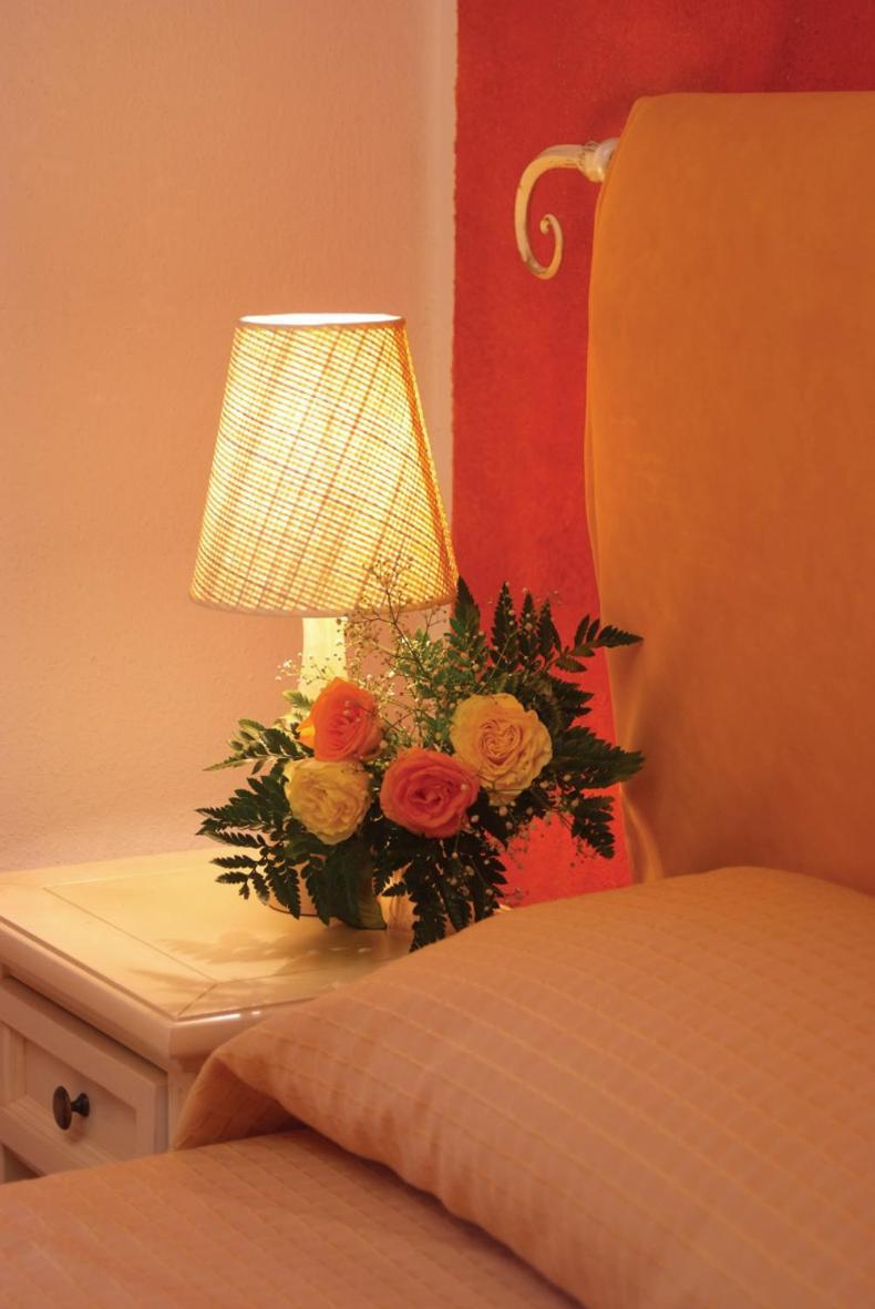 Hotel Corallo Isola Rossa Bagian luar foto