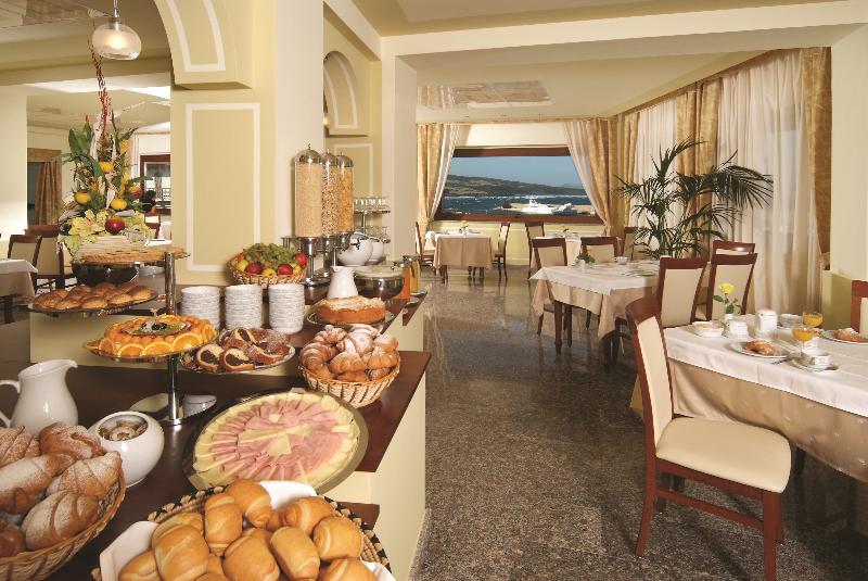 Hotel Corallo Isola Rossa Bagian luar foto